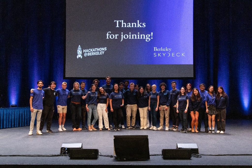 The AI Hackathon 2024 team on stage in front of a 'Thanks for joining!' Berkeley SkyDeck screen