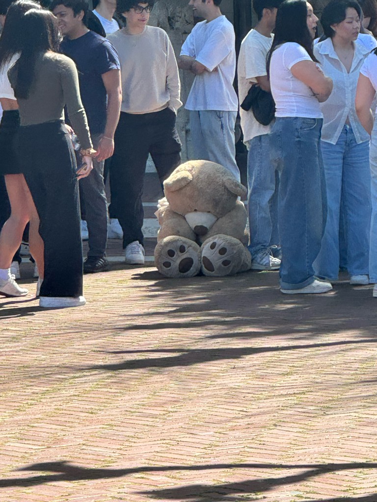 The giant bear sitting among a crowd on Sproul Plaza
