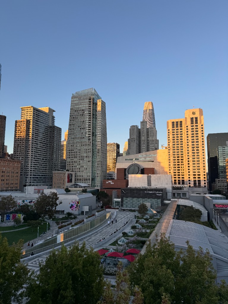View of the San Francisco skyline and Yerba Buena Gardens at golden hour