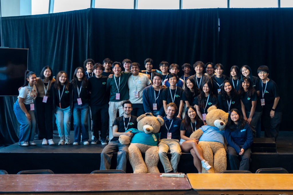 The full Cal Hacks 11.0 team on stage with the giant bears
